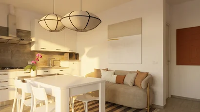 Soggiorno moderno con cucina, tavolo bianco e divano beige con cuscini